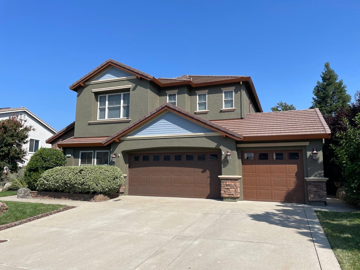 Two story stucco home exterior painted by Richards Painting